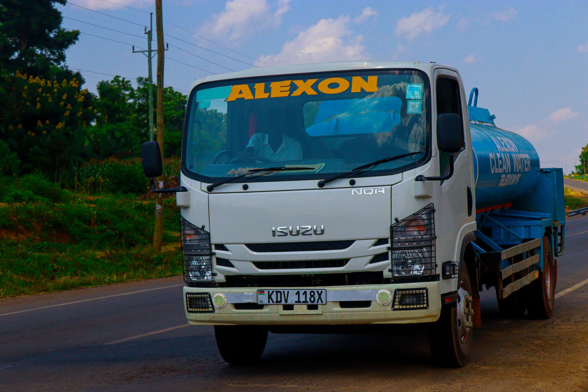 Alexon clean water bowser delivering to premises